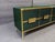 This exquisite dark green Italian buffet sideboard is a masterpiece of craftsmanship, blending Mid-Century Modern style...