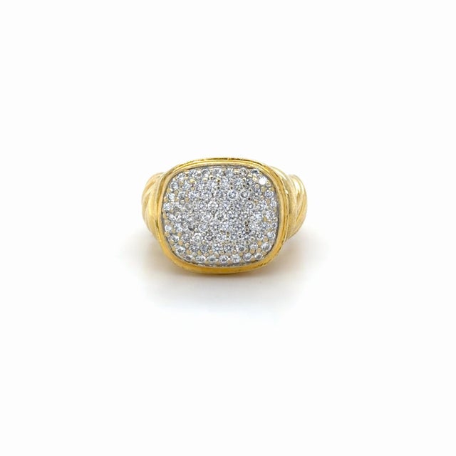 This classic ring designed by David Yurman from their Noblesse Collection, containing round brilliant cut diamonds...