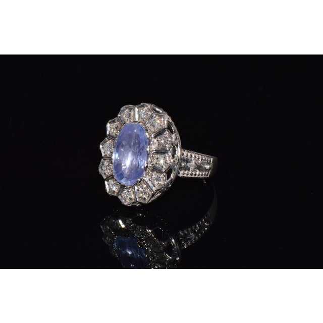 GIA certified 4.00CTS diamond and violet blue sapphire 18K solid gold Etruscan Art Deco ring. This ring features a huge...