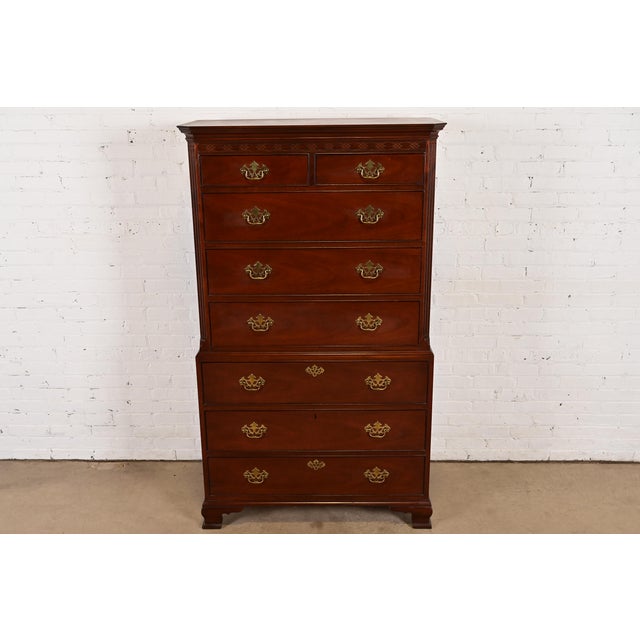 A gorgeous Georgian or Chippendale style eight-drawer highboy dresser or chest of drawers By Baker Furniture USA, Circa...