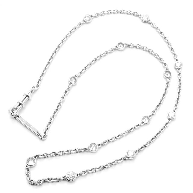 18k White Gold Diamond 12 Station Choker Necklace by Cartier. Details: Chain: Length 14.5" Weight: 6.3 grams Stones: With...