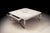 Handcrafted in Italy, this French Country coffee table features a hand-painted top finished in antique white with soft...