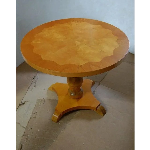 Luminous golden flame birch bordered with scalloped golden elm - a very handsome table! Originally used in Sweden as a...