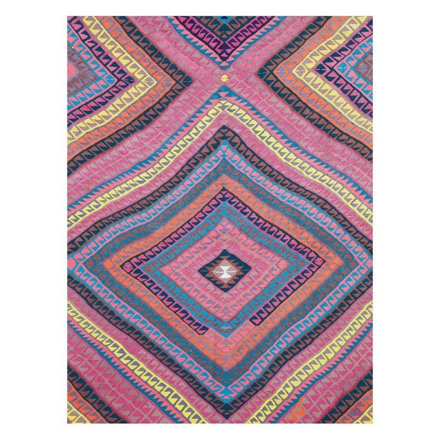 A vintage Turkish flat-weave Kilim room-size carpet in square format handmade during the mid-20th century with a colorful...