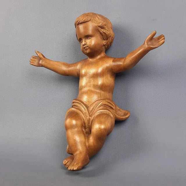 Handcrafted Carved Wood Sculpture of a Child, Italy, 20th Century, in Flawless conditions. Designed 1950 to 1959