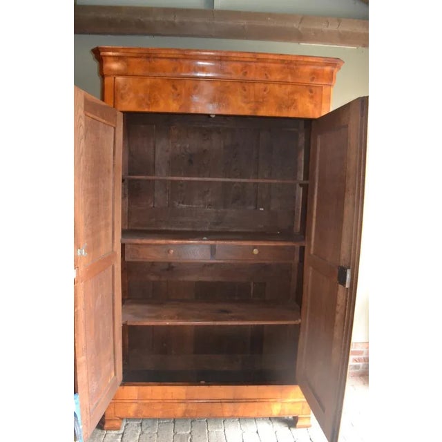 19th century French cherry Louis Philippe Kast. The sizes are 228x142x56. Behind the two doors boards and drawers. from...