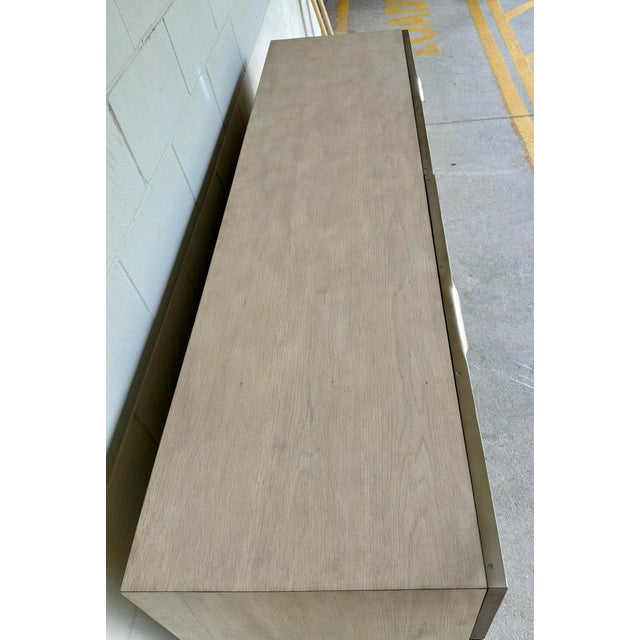 Original retail $7920, stylish Jonathan Charles Modern Capillary Dresser, hand carved waved design finished in a white...