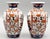 Antique fine quality pair of Japanese porcelain Imari vases.. Circa 1900, they are hand painted in s traditional colors...