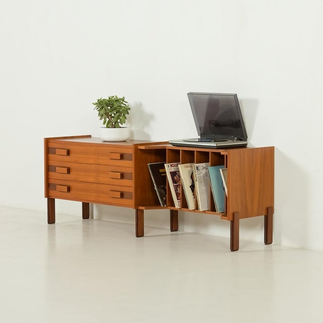 This Italian mid-century sideboard most likely comes from the 1970s, and it is a versatile and beautifully crafted piece,...