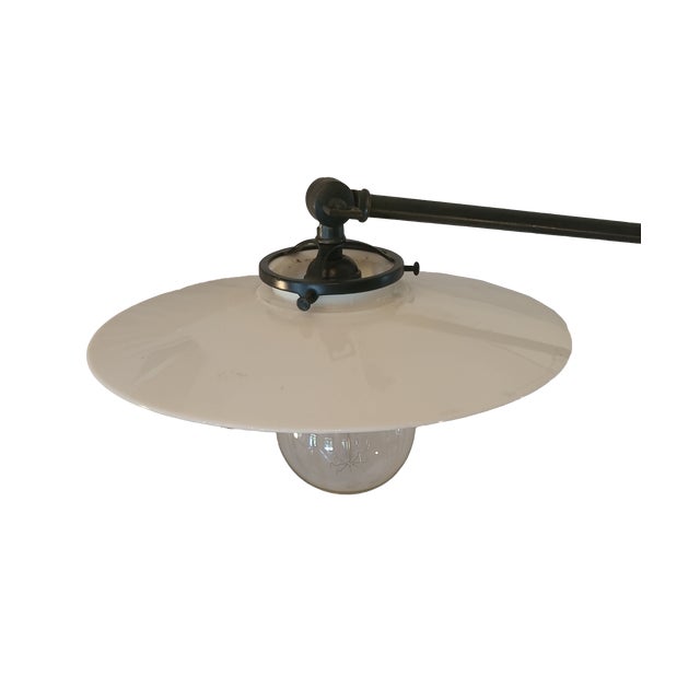 Very unique industrial style floor lamp with a cast iron and wood base, multiple adjustment points with vintage knobs and...