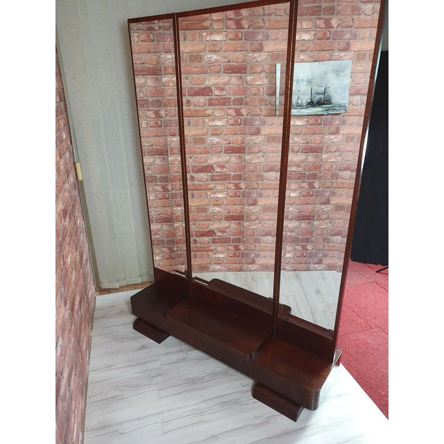 Full-body Art Deco tremolo from the turn of the 19th and 20th centuries. Made of teak wood. After a comprehensive...