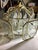The chandelier is in fantastic overall condition. The glass is free from cracks and chips, and the fixture is reported to...