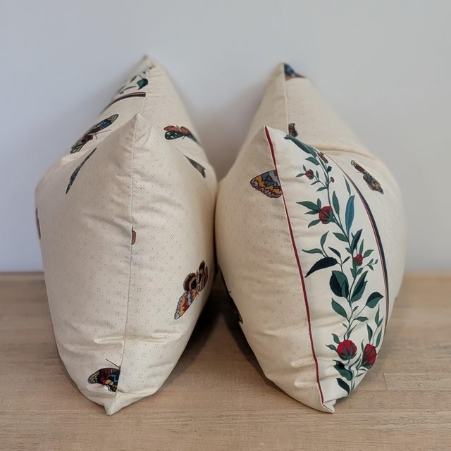 Decors Barbares Papillons Tchekhonine pillows feature fun butterfly print on geometric background with a bold floral...