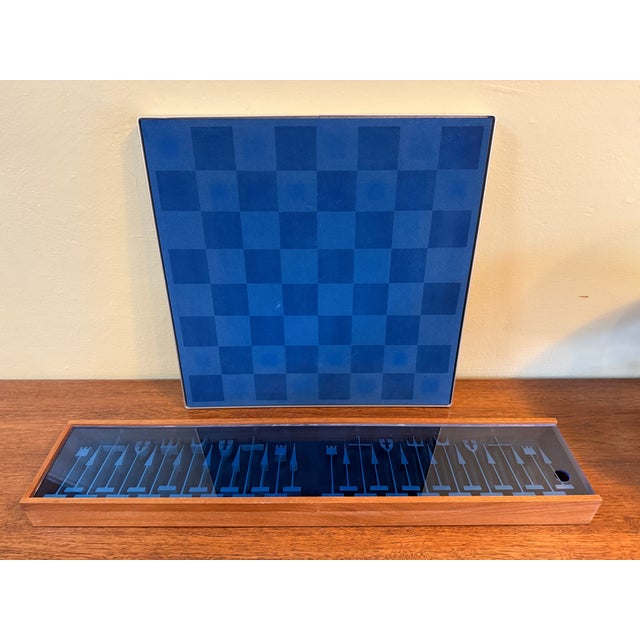 You are viewing the spectacular Alcoa Aluminum Chess Set + Board, designed by Austin Cox for Austin Enterprises c1962. One...