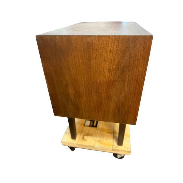 McM Stanley nightstand walnut with rosewood trim around the drawers. Two dovetail drawers- Measures 23” tall x15” deep...