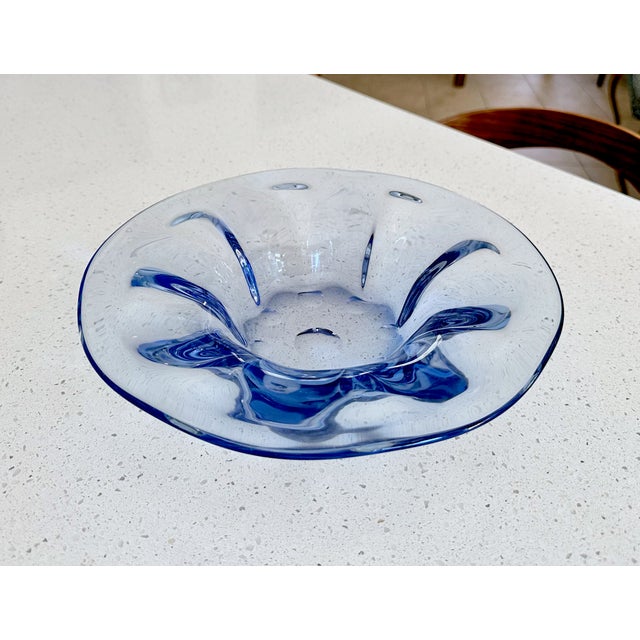 1950s biomorphic Murano venetian glass bowl features hints of cobalt blue and clear design with a folded, 8-lipped flower...