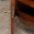This Vintage John Richard Demi Lune Cabinet, brought to you by Niagara Furniture, was produced by master craftsmen that...