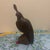 A beautifully stylized Mid-Century modern hand-carved desert ironwood sculpture depicting a California quail. The artisan...