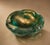 Bring authentic Mid-Century Modern elegance into your home with this stunning vintage Murano-style art glass ashtray,...