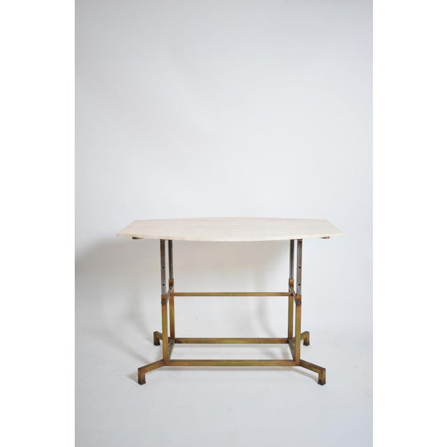 Golden iron and iron and travertine table, 1970s. Bronze golden iron, iron and travertine adjustable middle table console...