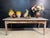 A French Kitchen Dining Table from the region of Normandy. Made from Chestnut and dating to the mid 19th Century. It has a...