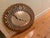 A striking vintage Spanish Colonial-style sunburst mirror from Peru. The oval mirror plate is framed by a hand-set ring of...