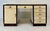 Elegant Italian Art Deco desk from the 1940s, crafted in parchment with contrasting dark exotic hardwood profiles and...
