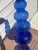 Bring a striking pop of vibrant color to your decor with this stunning mid-century art glass vase. Featuring a rich royal...