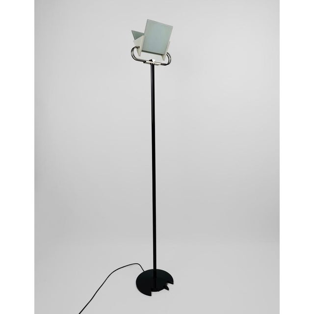 A Postmodern floor lamp of great charm, made in Italy by the historic lighting company Arteluce founded in 1939 by Gino...