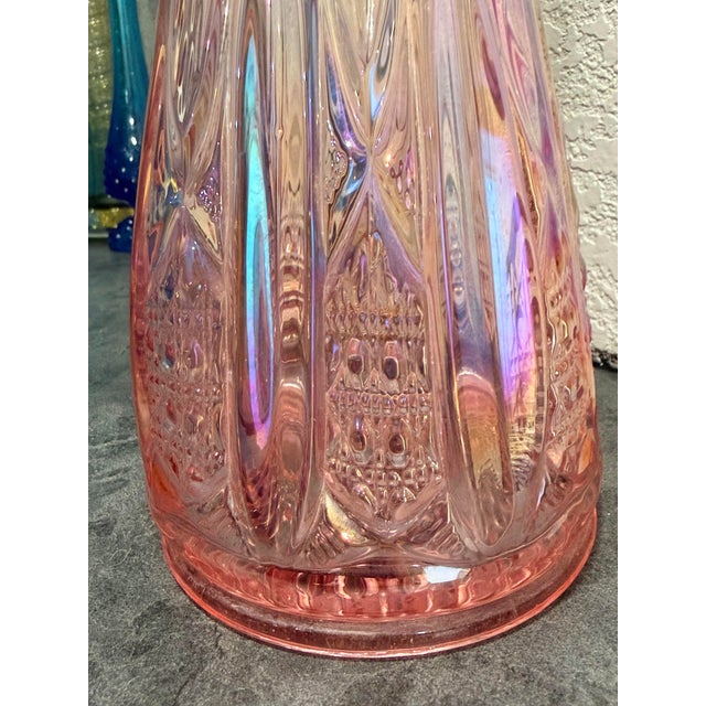 Mid-20th century, a period when traditional carnival glass techniques were revisited. The vase is made of glass with an...