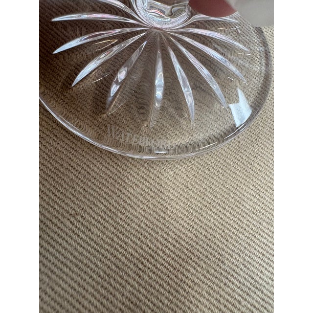 The Araglin Claret Glass by Waterford is a beautifully crafted crystal stemware piece featuring elegant vertical and...