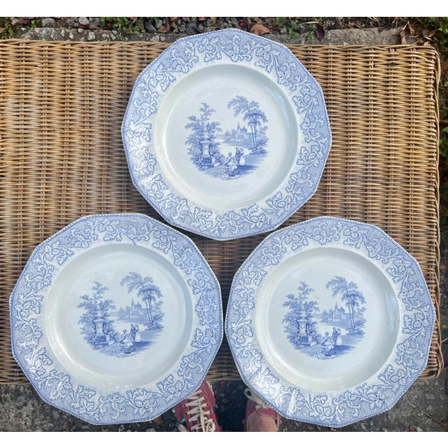A set of three very rare plates. Traditional transfer ware methods on ironstone. All the same each features an enchanting...