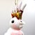 Bring whimsical elegance to your holiday display with this striking, hand-painted mouth-blown glass cockatoo ornament....