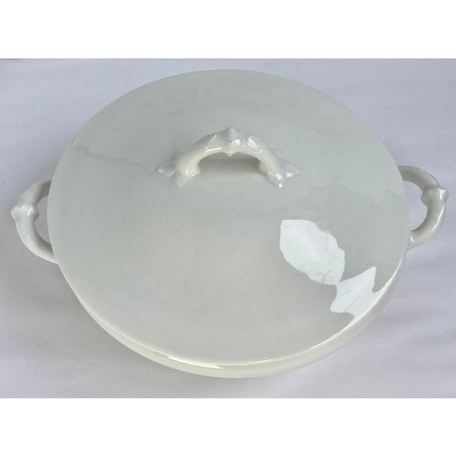 A beautiful, simple, and useful lidded serving dish. It’s possible it is older because the Haviland family has been...
