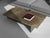 Memoria coffee table in jurassic fossil stone by nerinea. Dimensions: w 75 x d 130 x h 25 cm. Materials: natural stone...