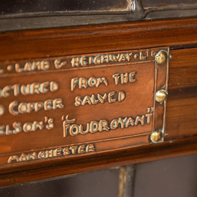 A 19th century rare timber corner cabinet, made from the oak salvaged from the foudroyant, lord nelson’s flagship. A lead...
