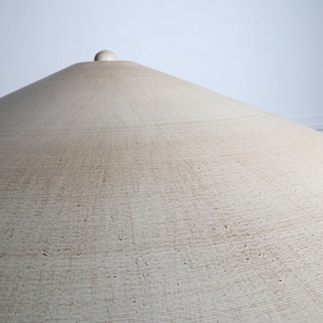 Neoclassical modern travertine cast iron and brass sculptural lamp with metal shade. Designed by Michael Taylor. Fantastic...