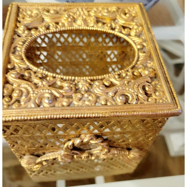 Vintage metal gold Hollywood Regency braided tassel tissue box cover holder. An elegant tissue box cover in gold metal...