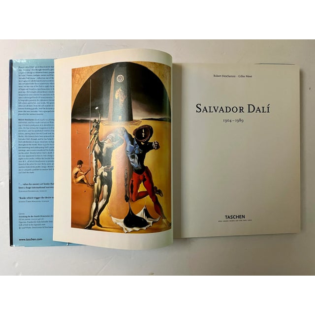 224pp, color illustrations throughout, chronology, notes, bibliography, Dali's exhibitions. Blue laminated boards in dust-...