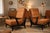 A superb pair of vintage armchairs dating from the 1950s, boasting a distinctly modernist design and elegant presence....