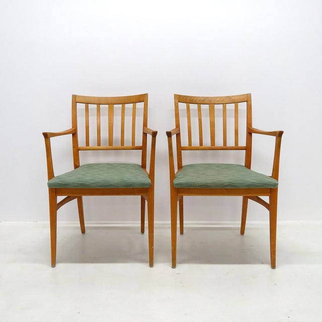 Wonderful set of six dining chairs in beech, by Carl Malmsten for Waggeryds Möbelfabrik AB, Sweden, 1950, all with arm...