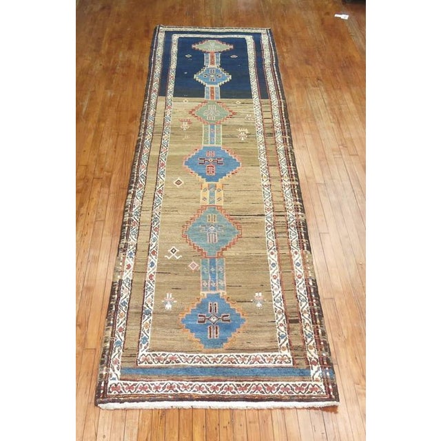 Eclectic tribal looking abrashed Persian Kurd runner. Measures: 3'7" x 13'11".