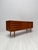 Elegant danish sideboard model 18 designed by gunni omann for omann jun during the 1960s. Crafted in teak, the piece...