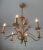 This French lamp from the 1950s features plant motifs and has been restored and refinished in a soft gold. The piece...