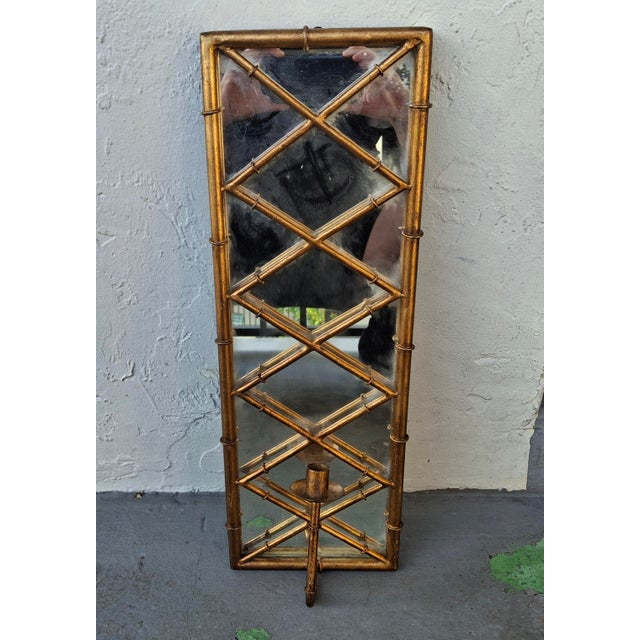 1940's Hollywood Regency Gilt Iron Faux Bamboo Form Wall Mirror with Candle Holder