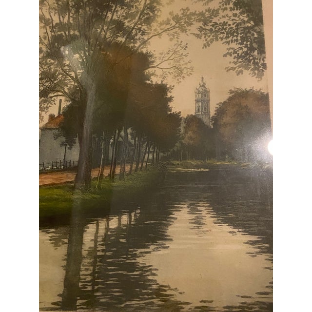 Atmospheric early 20th-century European canal landscape etching signed “F. Roth” in pencil at the lower right. This...