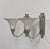 Hubert Petitot & Degué A pair of French steamline art deco wall sconces in nickel plated bronze by Petitot. Made circa...