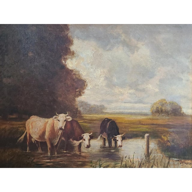 Stunning antique oil painting by American artist James T. Breen (1859-1940) depicting a trio of cattle gathered at a...