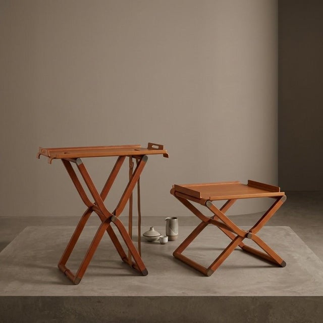Rena Dumas and Hermès Paris "Pippa" folding side table, Paris, circa 1985, in pear wood and brass; marked "HERMÈS / PARIS"...