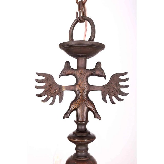 Beautiful chandelier with patina. Very high-quality bronze finish. Top with Flemish eagle. The chandelier has a completely...